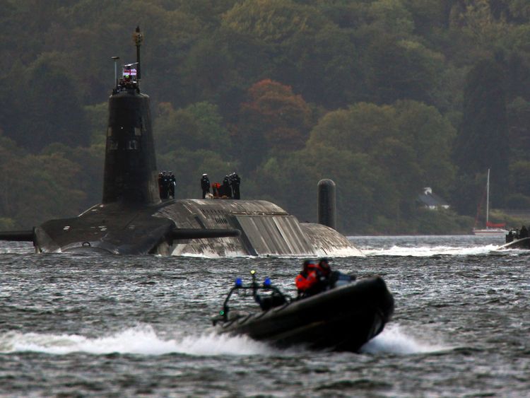 FASLANE, SCOTLAND - SEPTEMBER 23: A trident submarine makes it's way out from Faslane Naval base on September 23, 2009 in Faslane, Scotland. British prime minister Gordon Brown, will tell the UN the he will cut the trident missile carrying submarine from four to three. (Photo by Jeff J Mitchell/Getty Images)