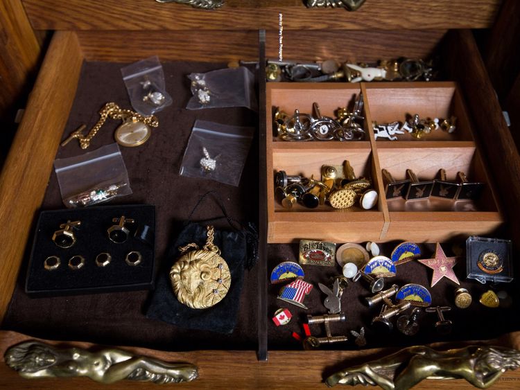 Various trinkets and two ashtrays carved into a nude woman are among the collection  Pic: Julien's Auctions 