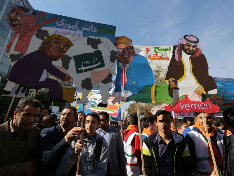 Protesters mock President Donald Trump, Saudi Arabia's King Salman and Crown Prince Mohammed bin Salman