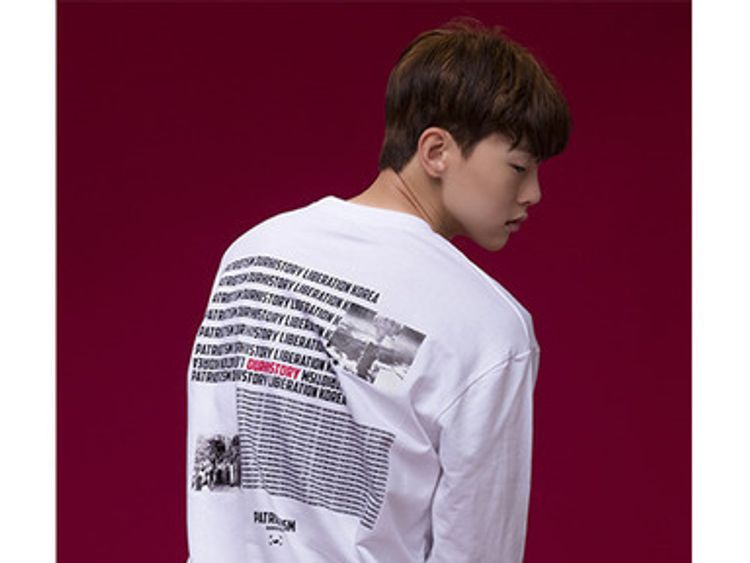 The shirt, being worn here by a model, is listed as sold out on Our History's website