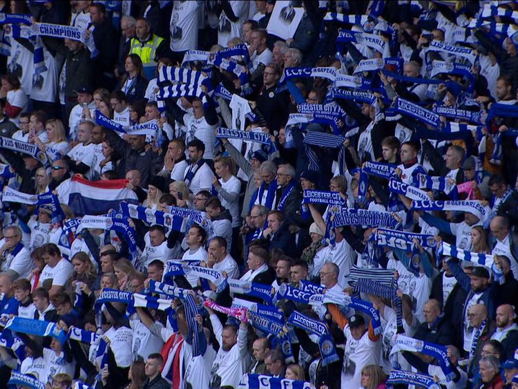 Fans held up their team scarves as a mark of respect