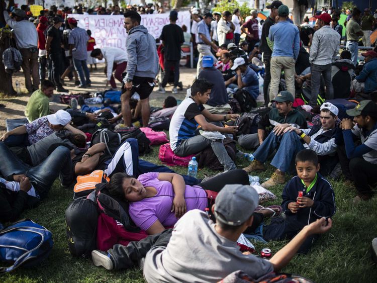 Central American migrants -mostly Hondurans- moving in a caravan towards the United States in hopes of a better life, rest after holding a demonstration in Mexicali's downtown in Mexico's Baja California State, on the border with Calexico, in California, US, on November 19, 2018