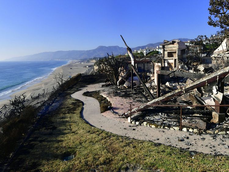The ruins of one of the beachside mansions at Point Dume State Beach after the fire
