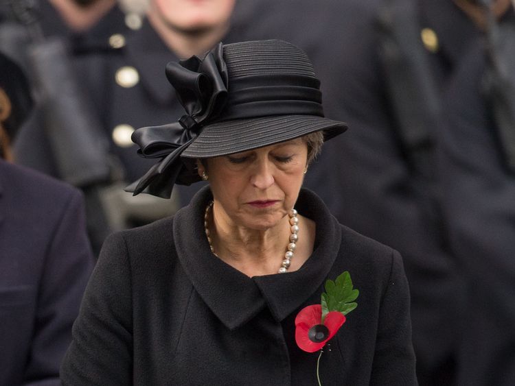Mrs May, pictured at the 2017 Remembrance Sunday service in Whitehall, will lay a wreath alongside a German leader