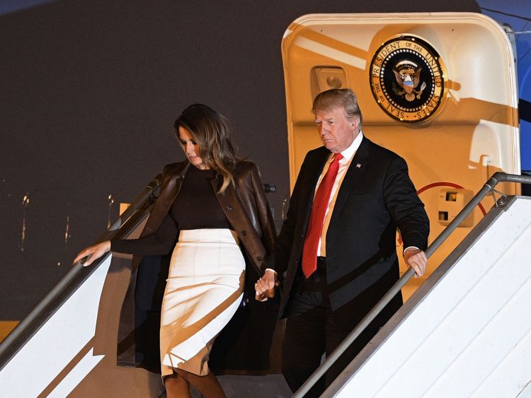 Mr Trump and First Lady Melania arrive on the eve of the summit