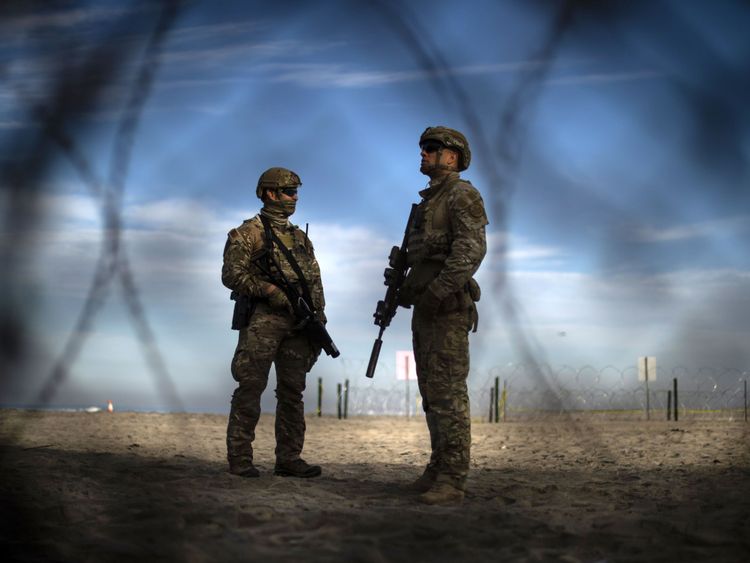 US border security officers patrol the area next to the Mexico frontier  south of San Diego