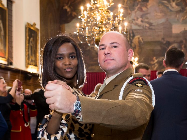 **STRICTLY EMBARGOED UNTIL 00:01 SATURDAY 10 NOV 2018** Oti Mabuse dances with a soldier from the Household Cavalry Regiment at the Royal Hospital Chelsea.