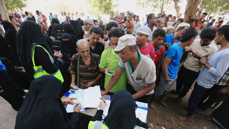 Yemenis gather at a UN aid distribution centre in Hodeidah