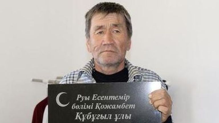 Aigali Supygaliev posed with his gravestone after re-emerging