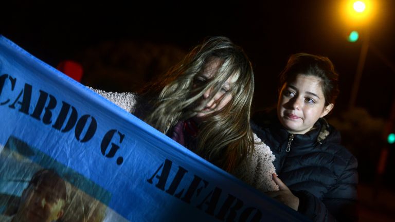 Relatives of the 44 crew members of the missing at sea ARA San Juan submarine react outside the Argentine Naval Base where the submarine sailed from, in Mar del Plata, Argentina November 17, 2018. REUTERS/Marina Devo