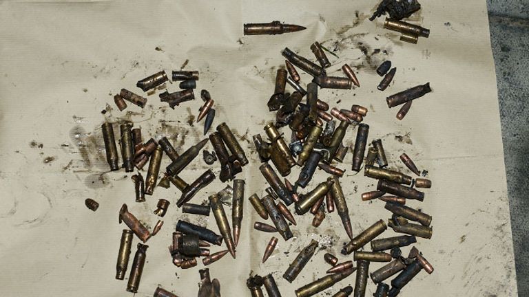 Hundreds of rounds of ammunition were found in the boiler house