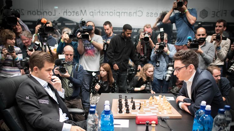 Magnus Carlsen retains world chess championship title after