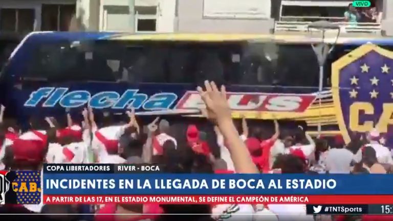 TV pictures show the Boca Juniors bus being attacked. Pic: @golazoargentino