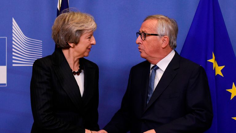 EU Commission President Jean-Claude Juncker (R) welcomes British Prime Minister Theresa May for a meeting at the EU Headquarters in Brussels on November 21, 2018. - The British Prime Minister on November 21 briefly escaped the Westminster bear pit to bring her Brexit battle to Brussels, just four days before the divorce deal is to be signed. (Photo by JOHN THYS / AFP) (Photo credit should read JOHN THYS/AFP/Getty Images)
