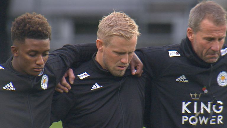 Kasper Schmeichel sheds a tear during a minutes silence for Leicester City owner.