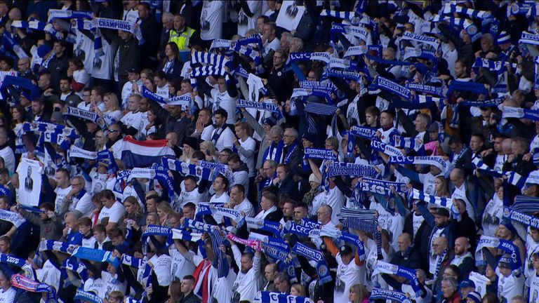 Fans held up their team scarves as a mark of respect