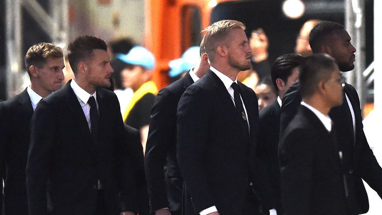 Wes Morgan (R) Kasper Schmeichel and Jamie Vardy were among those who visited