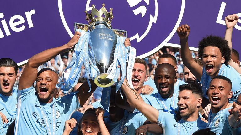 Manchester City&#39;s players celebrate after winning the Premier League in May