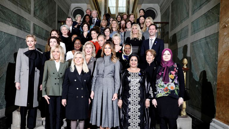 Mrs Trump with leaders' partners in Paris last week