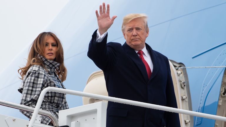 Donald and Melania Trump board Air Force One for France