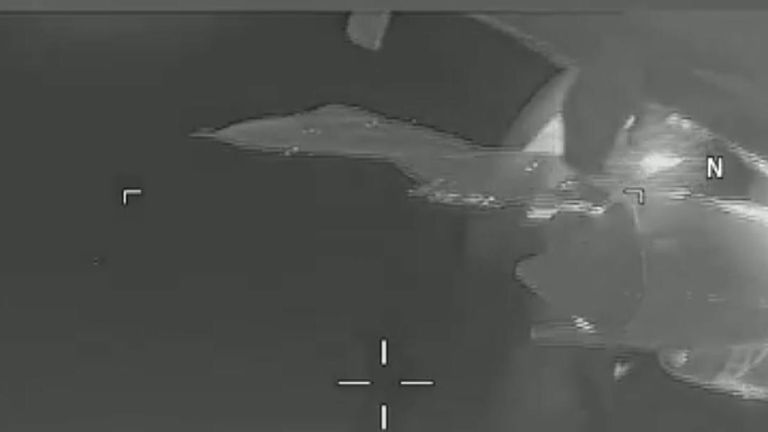 The US Navy released footage showing an armed Russian Su-27 jet passing dangerously close to a US EP-3 Aries spy plane.