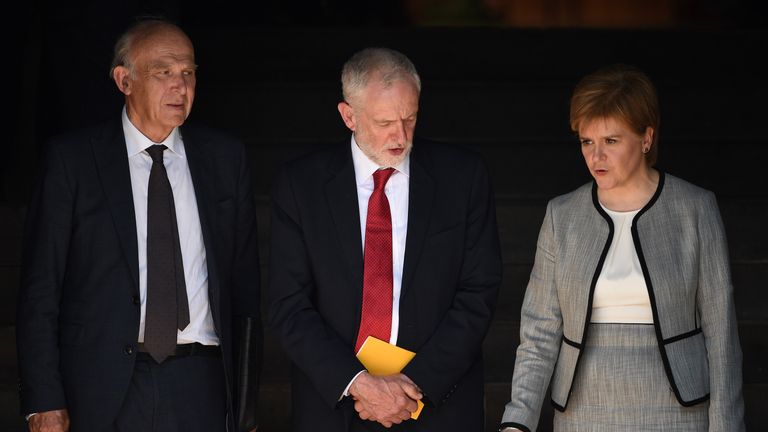 Britain&#39;s opposition Labour party Leader, Jeremy Corbyn (C), Scotland First Minister Nicola Sturgeon (R), and Britain&#39;s leader of the Liberal Democrats, Vince Cable leave after attending The Manchester Arena National Service of Commemoration at Manchester Cathedral in central Manchester on May 22, 2018, on the one year anniversary of the deadly attack at Manchester Arena. 