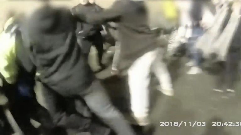 A fight between youths broke out and enveloped police