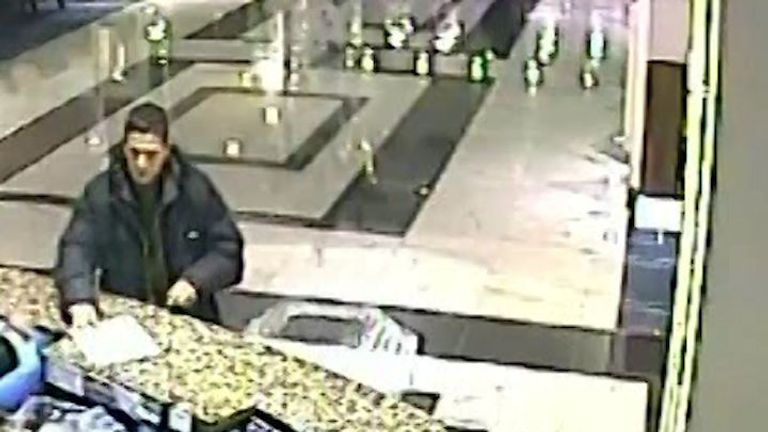 CCTV shows one suspect asking a hotel receptionist for a sheet of paper