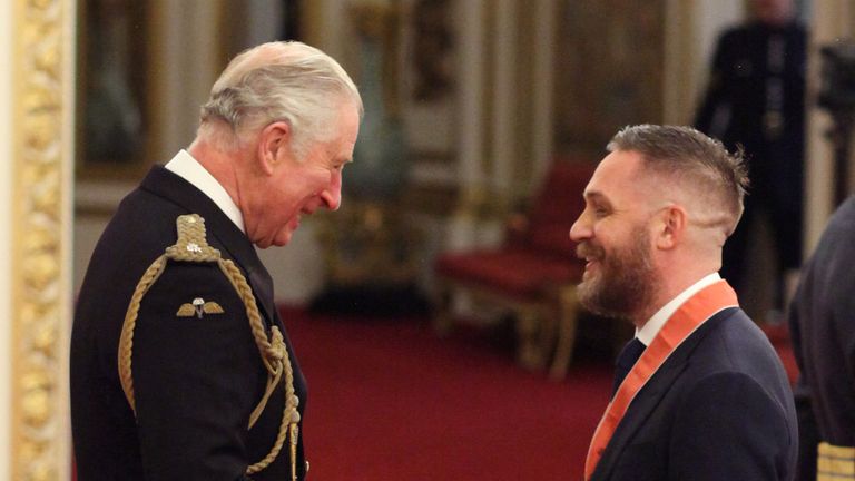 Actor Tom Hardy is made a CB (Commander of the Order of the British Empire) by the Prince of Wales at Buckingham Palace