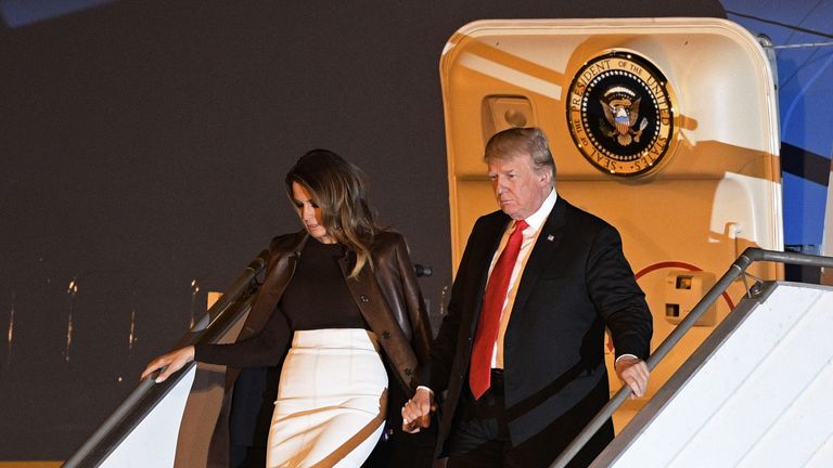 Mr Trump and First Lady Melania arrive on the eve of the summit