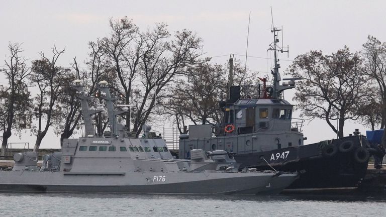 Seized Ukrainian ships, small armoured artillery ship and a tug boat, anchored in a port of Kerch, Ukraine 