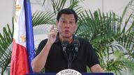 Philippines President Rodrigo Duterte delivers a speech at the Davao international airport terminal building early on September 30, 2016, shortly after arriving from an official visit to Vietnam. Duterte on September 30 drew a parallel with his deadly crime war and Hitler&#39;s massacre of Jews, as he said he was &#39;happy to slaughter&#39; millions of drug addicts. / AFP / MANMAN DEJETO (Photo credit should read MANMAN DEJETO/AFP/Getty Images)

