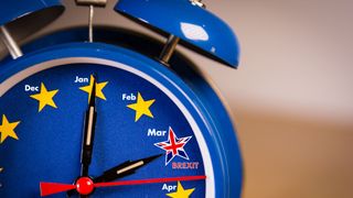 Retro alarm EU clock representing the countdown until Brexit. - Stock image
