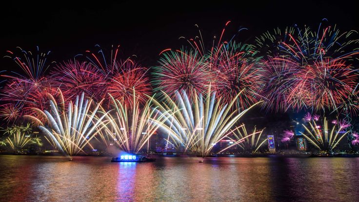 Fireworks explode over Victoria Harbour during New Year celebrations in Hong Kong