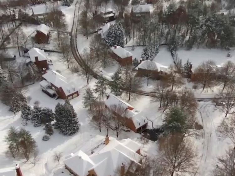 An aerial view shows snow in Cave Spring, Virginia, U.S., December 10, 2018, in this still image taken from a social media video. Pic: Mark Patterson