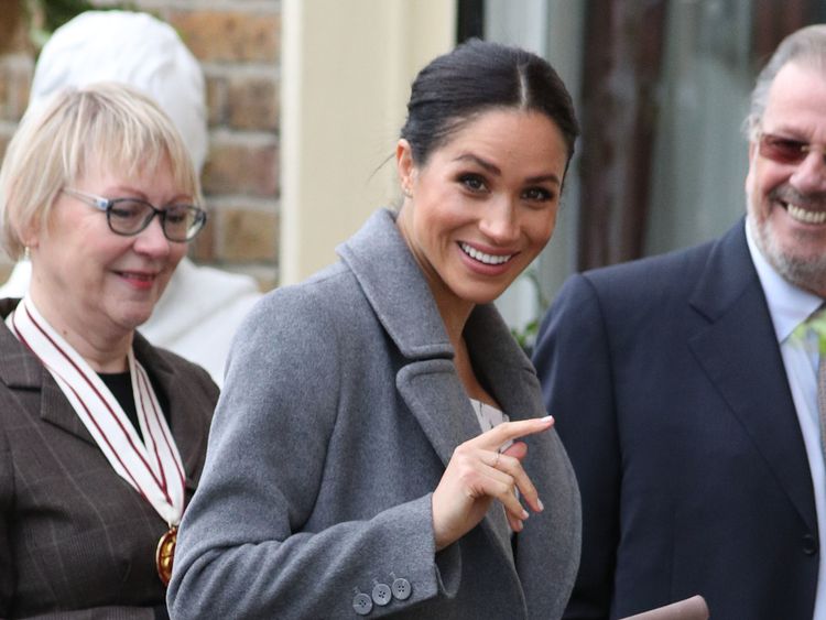 Meghan was all smiles as she arrived at Brinsworth House