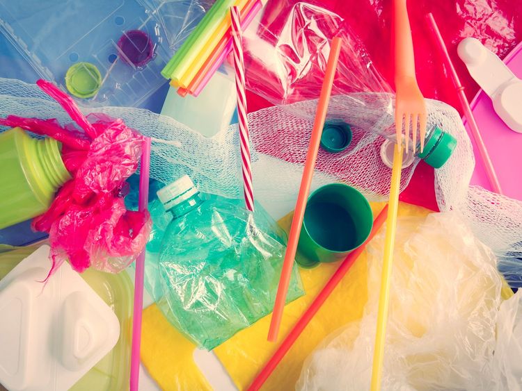 School leaders are being urged to cut the use of plastic items such as straws and bottles