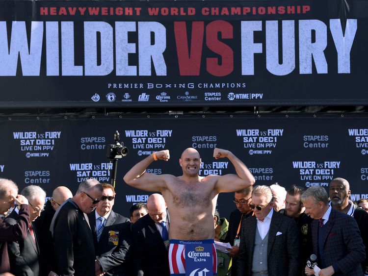 Tyson Fury poses during the Deontay Wilder v Tyson Fury weigh-in 