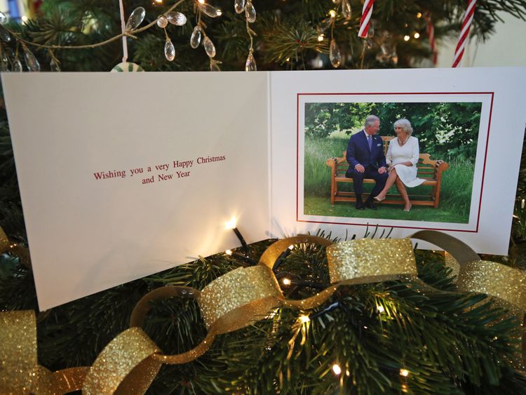 The Prince of Wales and Duchess of Cornwall are shown seated together on their card 