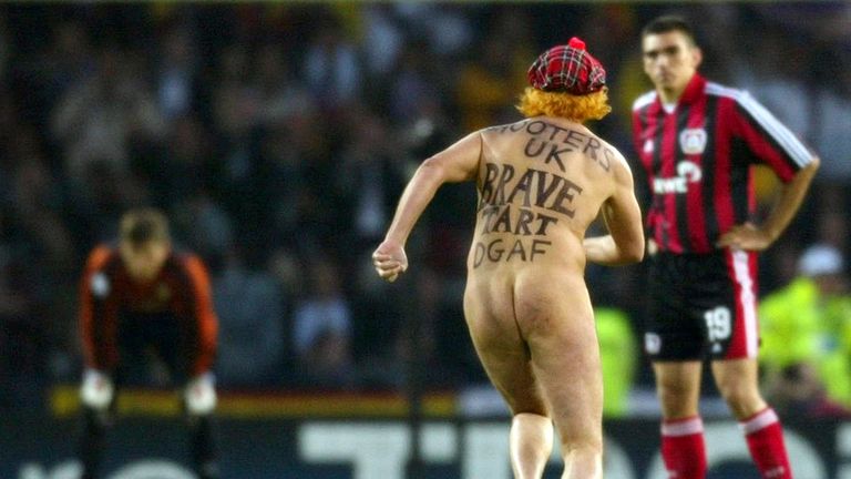A wig-wearing Mr Roberts streaks during the 2002 Champions League final between Bayern Leverkusen and Real Madrid