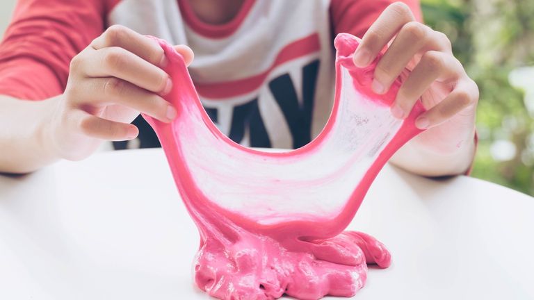 Children can pull and twist slime toys into different shapes 