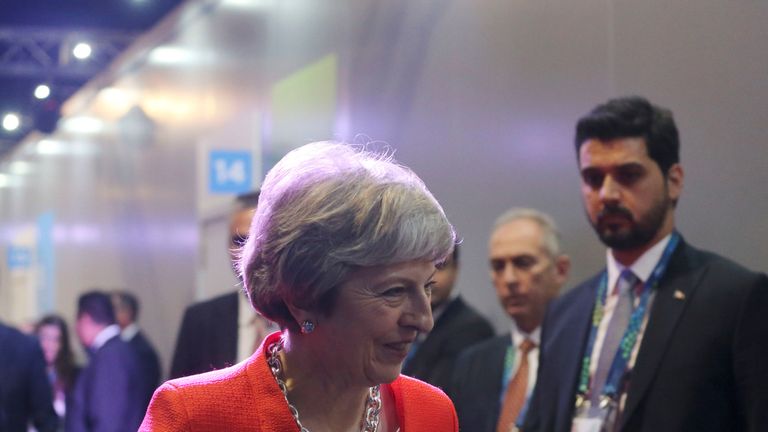 Britain's Prime Minister Theresa May arrives for a bilateral meeting with Turkey's President Recep Tayyip Erdogan at the G20 Leader's Summit in Buenos Aires, Argentina, Saturday, Dec. 1, 2018