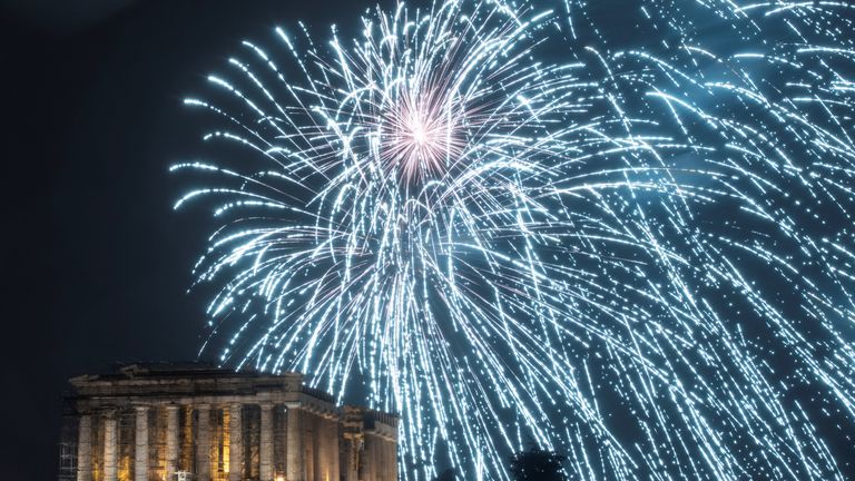 Fireworks explode over the ancient Parthenon temple in Athens, Greece