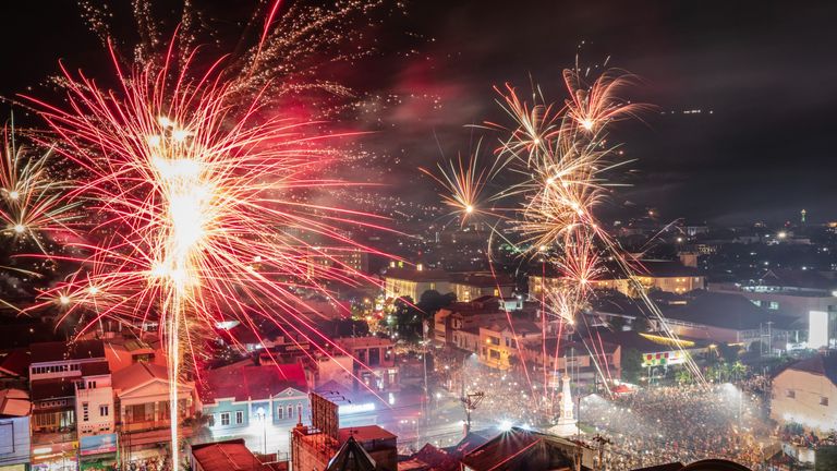 Fireworks illuminate skyline of Yogyakarta, Indonesia