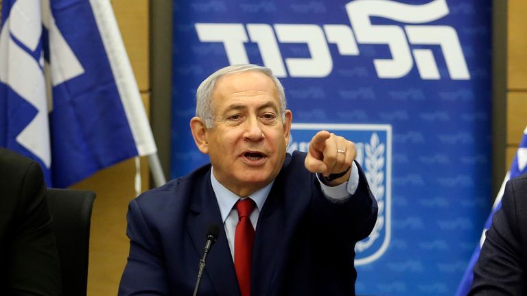 Israeli Prime Minister Benjamin Netanyahu delivers a statement at the Israeli Parliament in Jerusalem