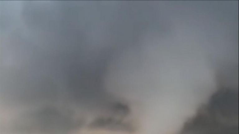 Tornado tears across farmland in Illinois