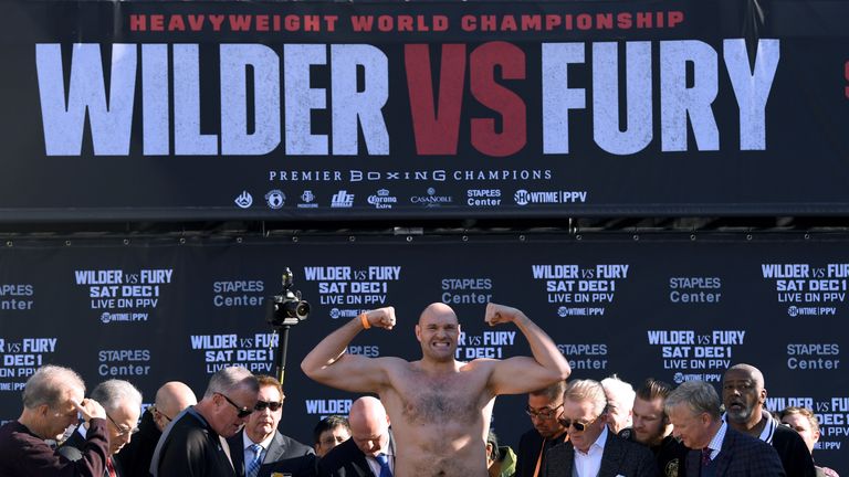 Tyson Fury poses during the Deontay Wilder v Tyson Fury weigh-in 