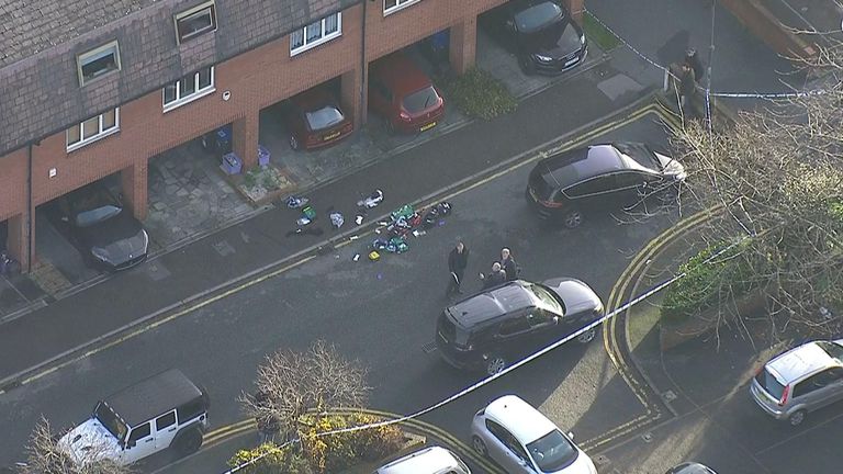 Police at the scene in south Wimbledon