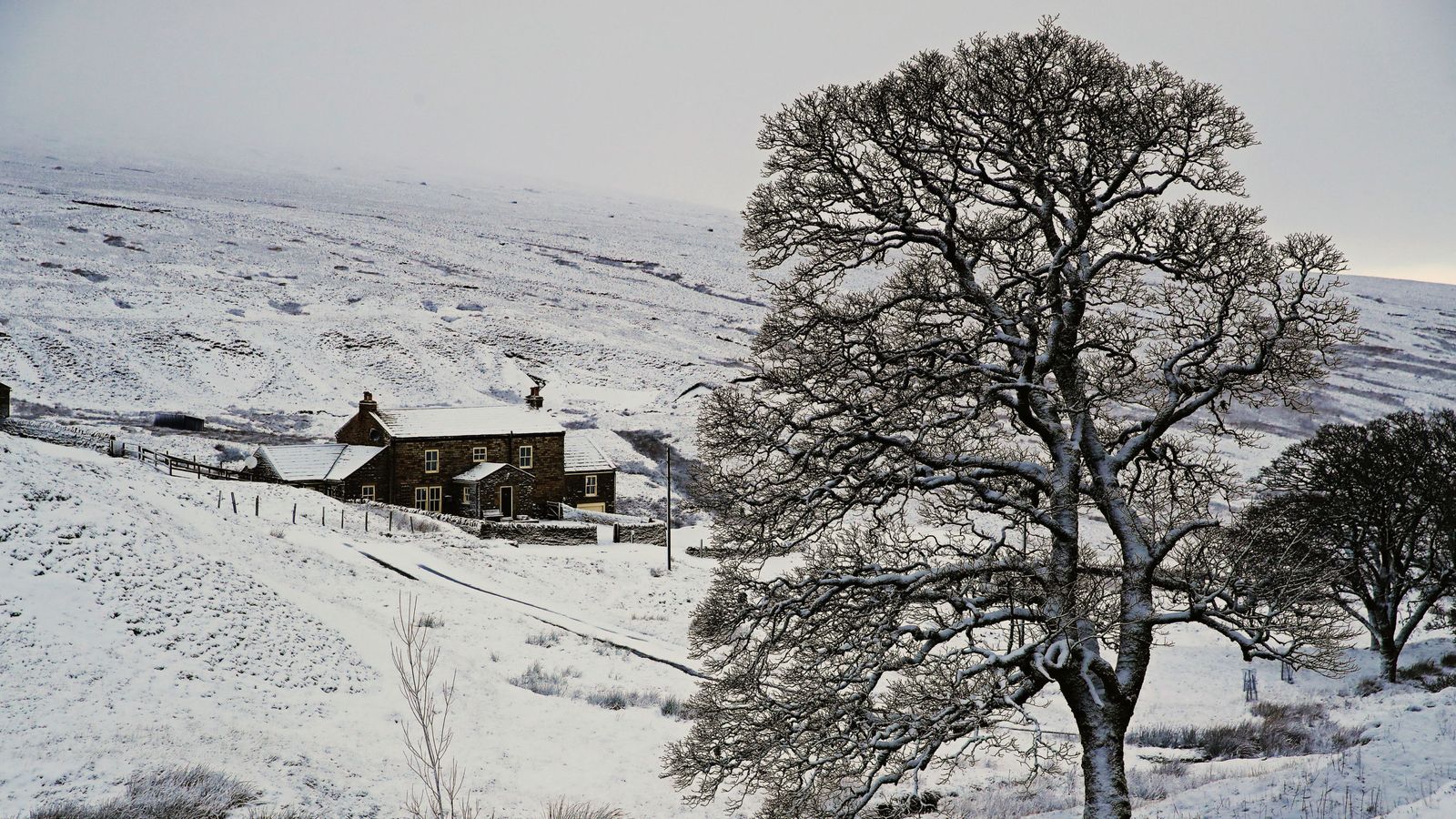 UK weather Schools closed and flights cancelled with more snow to