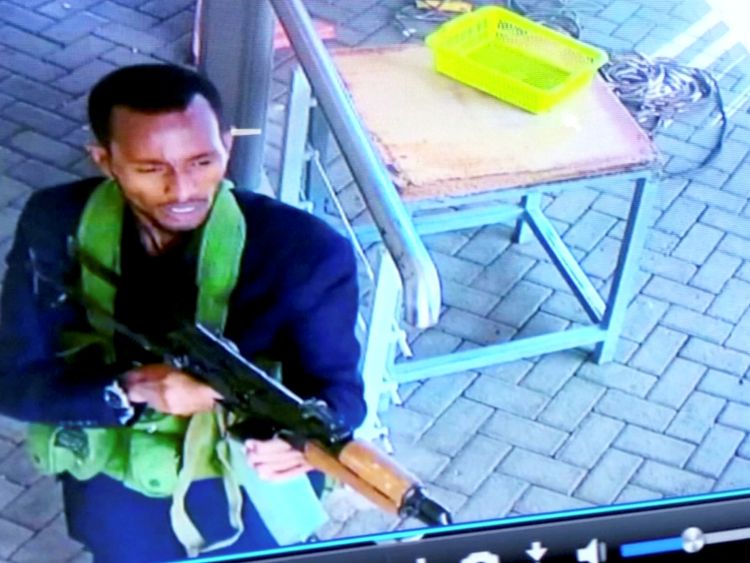 A gunman is pictured as he and others make their way into a hotel and office complex in Nairobi, Kenya, January 15, 2019, in this still image taken from a CCTV footage obtained by Reuters TV Janaury 16, 2019. REUTERS/Reuters TV NO RESALES. NO ARCHIVES. FOR REUTERS CUSTOMERS ONLY